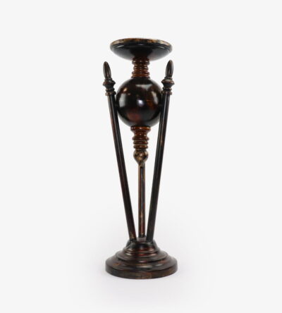 Wooden candlestick in dark brown color