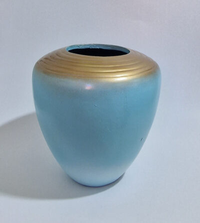 Blue ceramic vase with gold details
