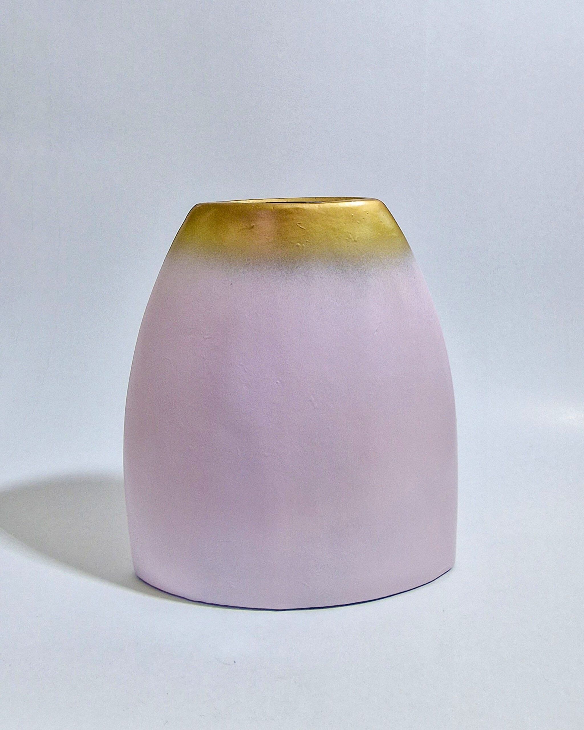 Pink ceramic vase with gold details