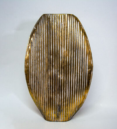 Metallic vase in gold color